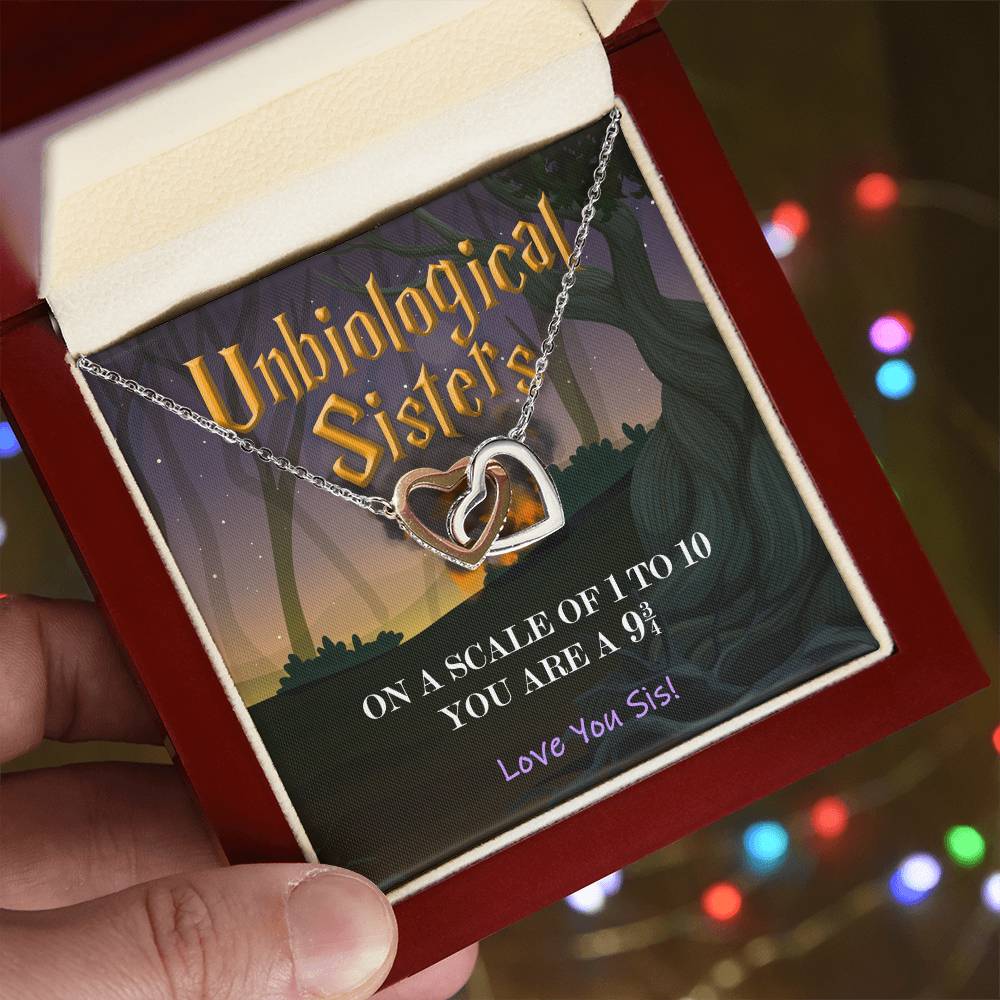 Unbiological Sisters - On A Scale - Necklace Interlocking Hearts Necklace